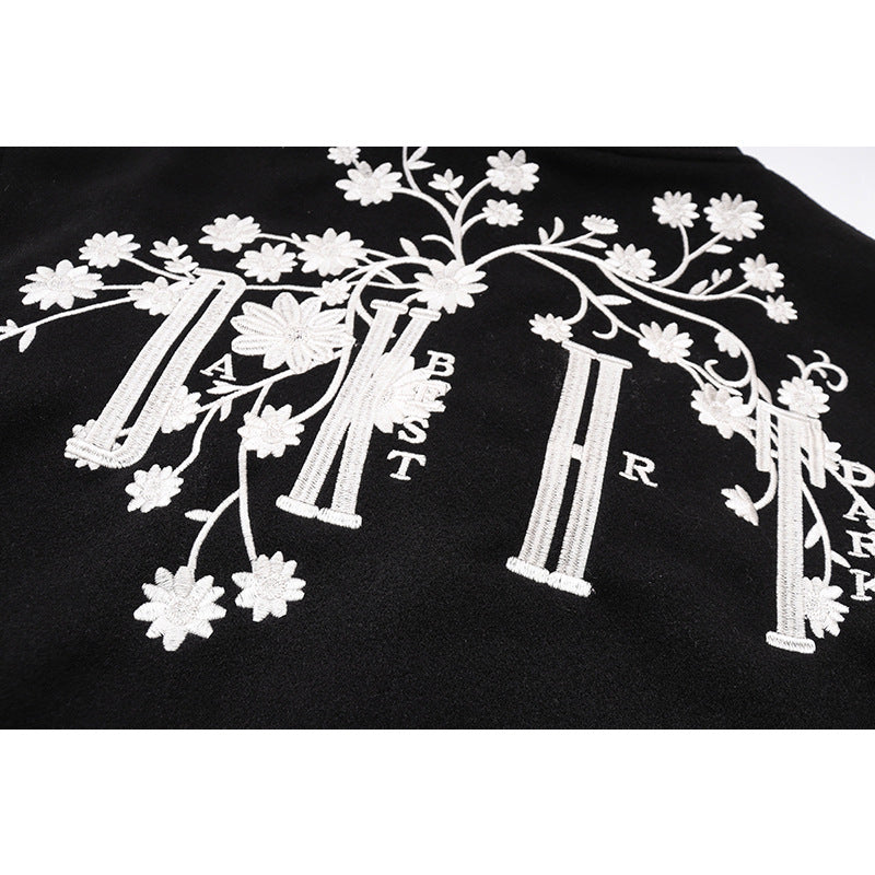 Baseball jacket with plum blossom embroidery and PU leather patchwork