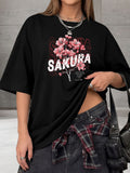 Plum blossom print loose short sleeved round neck T-shirt